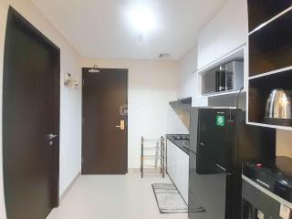 Spacious and Elegant 1BR at Patraland Amarta Apartment By Travelio - Kejayan - 8