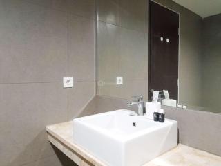 Minimalist and Cozy 1BR at Patraland Amarta Apartment By Travelio - Kejayan - 8
