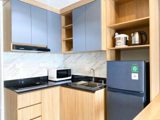 Homey and Spacious Studio Vasanta Innopark Apartment By Travelio - Cikarang - 1
