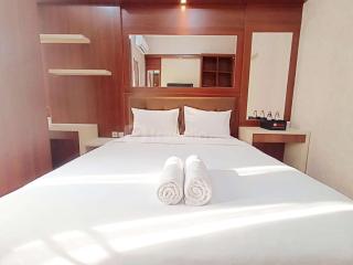 Modern Look and Homey Studio Amartha View Apartment By Travelio - Semarang - 9