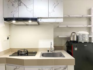Minimalist and Nice Studio at Vasanta Innopark Apartment By Travelio - Cikarang - 5