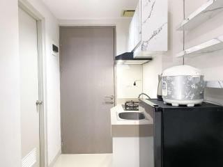 Minimalist and Nice Studio at Vasanta Innopark Apartment By Travelio - Cikarang - 4