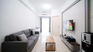 Compact and Homey 2BR at Benson Supermall Mansion Apartment By Travelio - Surabaya - 1