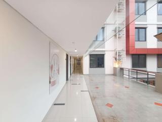 Best Homey and Restful Studio at Altuz Seturan Yogyakarta Apartment By Travelio - Seturan - 3