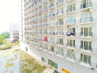 Comfort Minimalist Studio at 3rd Floor Grand Asia Afrika Apartment By Travelio - 9