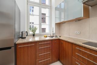 Gustowny Apartament z 2 sypialniami w Łodzi by Noclegi Renters - 1