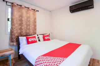 OYO 693 Tree House Cottage - 1