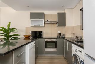 Lush Designer Apartment in CBD - Mountain Views - Cidade Do Cabo - 4