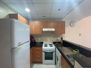 Very Convenient Apartment steps to Metro and Marina Mall Managed by SunnyHomes - Dubai - 5