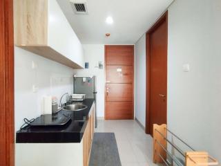 Tranquil Designed 2BR Apartment Dago Suites By Travelio - Bandung - 2