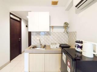 Modern 2BR at Mekarwangi Square Cibaduyut Apartment By Travelio - 2