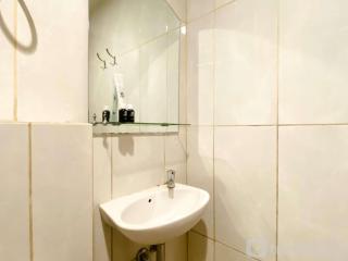 Modern and Homey Studio at Grand Kamala Lagoon Apartment By Travelio - 7