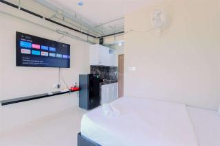Homey and Restful Studio Royal Sentul Park Apartment By Travelio - Bogor - 4