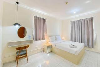 Relaxing Studio (Free IPL & Utilities) Grand Palace Kemayoran Apartment By Travelio - Giacarta - 8