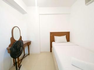 Well Furnished and Homey 2BR Bassura City Apartment By Travelio - 6