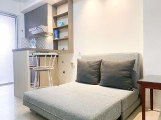 Well Furnished and Homey 2BR Bassura City Apartment By Travelio - Jakarta - 1