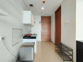Nice and Comfy 1BR at Dago Suites Apartment By Travelio - Bandung - 6