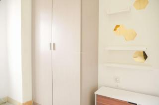 Modern and Classic 2BR at Green Pramuka City Apartment By Travelio - 8