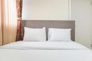 Good Deal and Relaxing 2BR Green Pramuka City Apartment By Travelio - 8