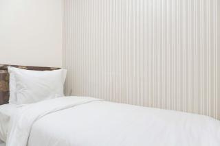 Good Deal and Relaxing 2BR Green Pramuka City Apartment By Travelio - 1