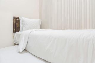 Good Deal and Relaxing 2BR Green Pramuka City Apartment By Travelio - 9