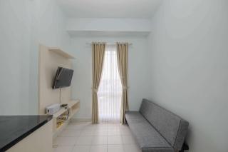 Comfy and Homey 2BR at Patraland Urbano Apartment By Travelio - 1