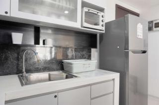 Restful and Modern 3BR at Daan Mogot City Apartment By Travelio - Jakarta - 6