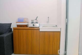 2BR Fully Furnished Minimalist Bassura City Apartment By Travelio - 9