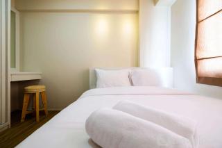 Connect to Pool 2BR Apartment at Bassura City By Travelio - 8