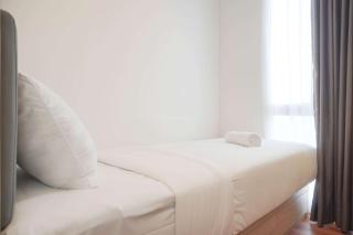 Cozy Living 2BR at Tokyo Riverside PIK 2 Apartment By Travelio - Rawalembang - 6