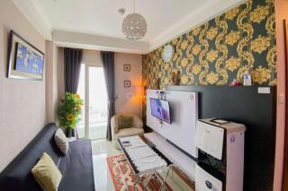 Homey and Warm 2BR at Signature Park Grande Apartment By Travelio - Jakarta - 6