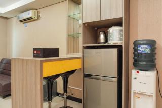 Comfy and Homey 1BR at Sky Terrace Apartment By Travelio - 6