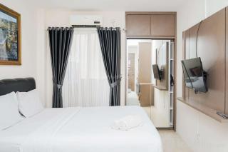 Homey and Comfact Studio at Medina Apartment By Travelio - 9