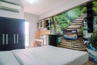 Warm and Cozy Stay Studio Green Bay Pluit Apartment By Travelio - 6
