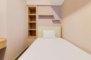 Homey and Modern 2BR at Casa de Parco Apartment By Travelio - Tangerang - 3