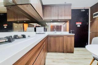 Homey and Modern 2BR at Casa de Parco Apartment By Travelio - Tangerang - 5