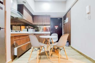 Homey and Modern 2BR at Casa de Parco Apartment By Travelio - Tangerang - 8
