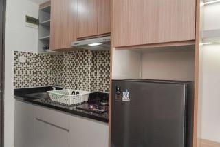 Best Deal and Homey Studio Apartment Amazana Serpong By Travelio - 4