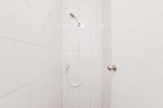 Simply and Homey Studio at Poris 88 Apartment By Travelio - 9