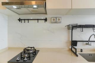 Cozy and Well Furnished Studio Sky House BSD Apartment By Travelio - 4