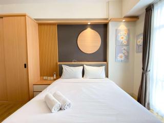 Best Homey 1BR at 52th Floor Vasanta Innopark Apartment By Travelio - Cikarang - 0