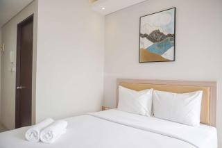 Warm and Minimalist Studio Transpark Bintaro Apartment By Travelio - Tangerang - 0