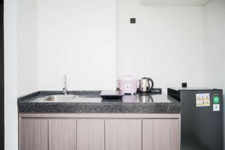 Nice and Restful 1BR Apartment Carstensz Residence By Travelio - Kampung Sawah - 3
