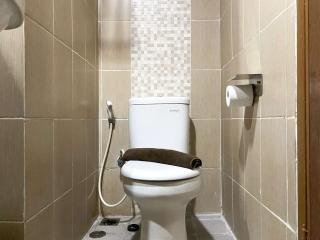 Restful and Comfy Studio Enviro Apartment By Travelio - Cikarang - 9