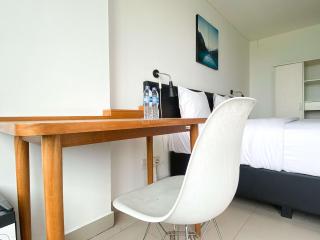 Restful and Comfy Studio Enviro Apartment By Travelio - Cikarang - 4