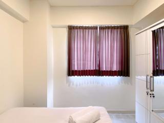 Comfortable 2BR with Working Room at Meikarta Apartment By Travelio - Cikarang - 6