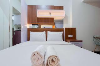 Scenic Studio Apartment at Vida View Makassar By Travelio - Pampang - 9