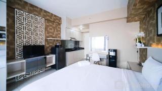 Modern and Cozy Stay Studio Apartment at Tanglin Supermall Mansion By Travelio - Surabaya - 9