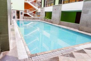 Strategic Studio Apartment at High Point Serviced By Travelio - Siwalapkerto - 9