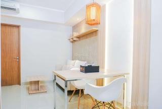 Clean and Elegant 1BR at The Oasis Apartment By Travelio - Cikarang - 1